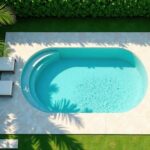 kleiner pool oval in tropischer gartenanlage mit palmen und liegen aus der vogelperspektive